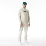 New Era Hellbeiges Milwaukee Bucks NBA Graphic férfi pulóver