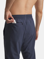 Under Armour Férfi sportnadrág UA Tech Utility Woven nadrág, szürke