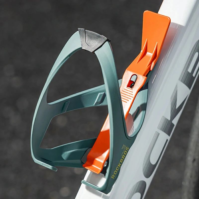 Rockbros 310013002 ROAD TO SKY Bottle Cage with Tire Lever - Blue-Orange niebieski || pomarańczowy training equipment