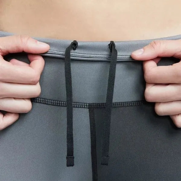 Nike_ Nike Fast-Women\'s Mid-Rise 7/8 Gradient-Dye Running Leggings with Pockets Leggings - Sportmania.hu