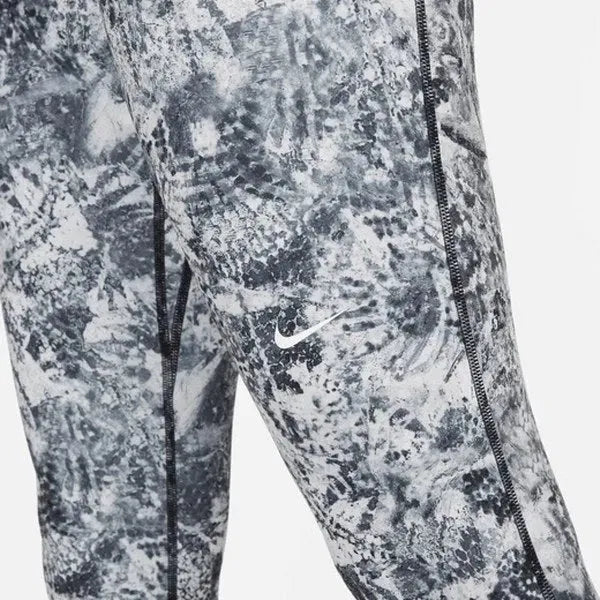 Nike_ Nike Pro Dri-FIT Womens Mid-Rise 7/8 All-Over-Print Leggings - Sportmania.hu